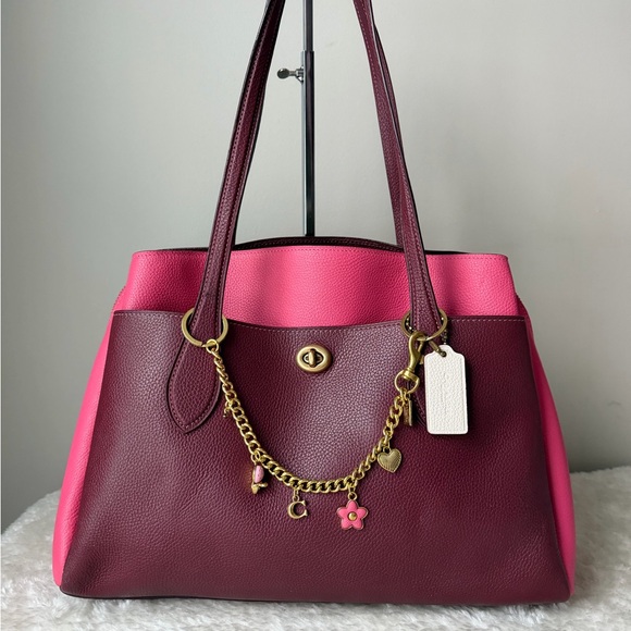 Coach Handbags - Coach Lora bag purse in pink and wine with chain charm